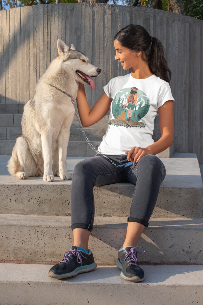 Woman in hiking t-shirt with dog