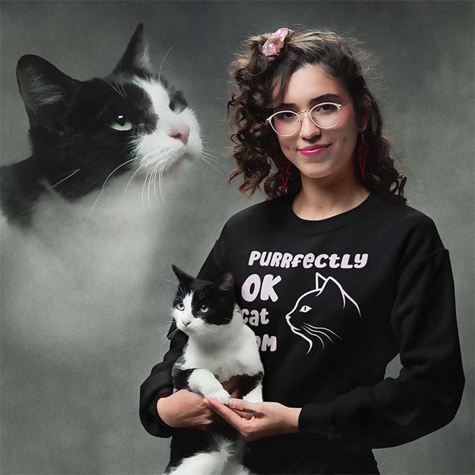 Man with cat wearing hoodie with text Purrfectly OK Cat Mom